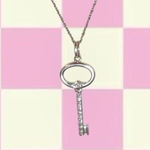 .925 Filled Skeleton Key with .25k 1/4ct Diamonds Pendant